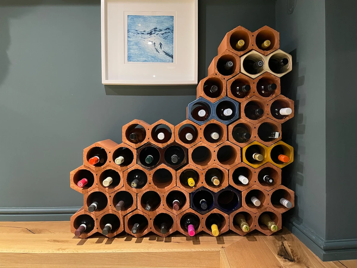 Asymmetric stack against teal wall